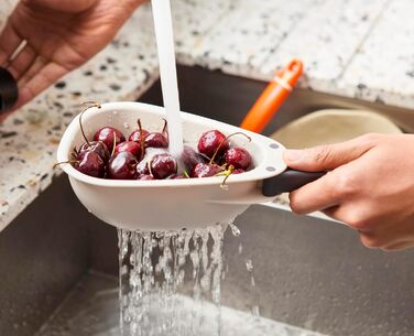 Дуршлаг со складными ручками, маленький Droplet Joseph Joseph